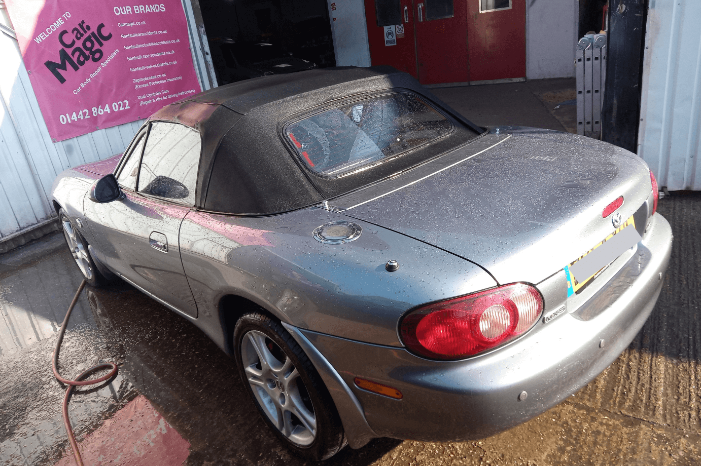 Mazda repair wash and wax