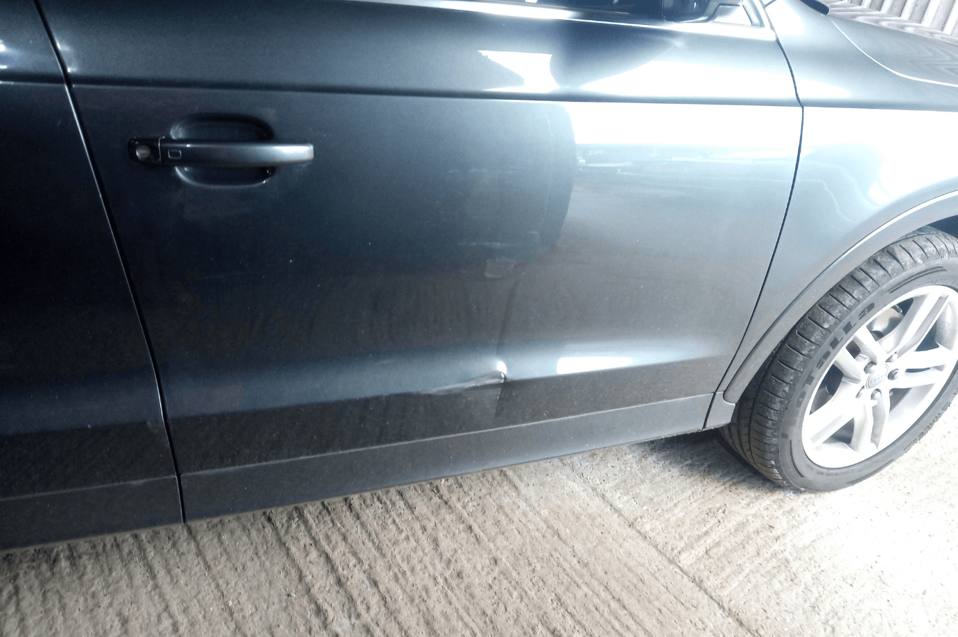 Audi door damage